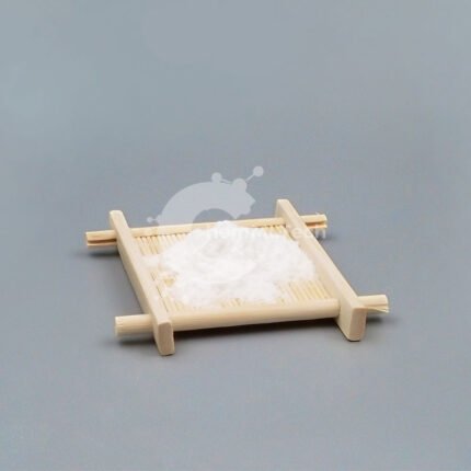 White Sodium Hyaluronate powder on bamboo tray, used as a moisturizing and anti-aging ingredient in skincare formulations