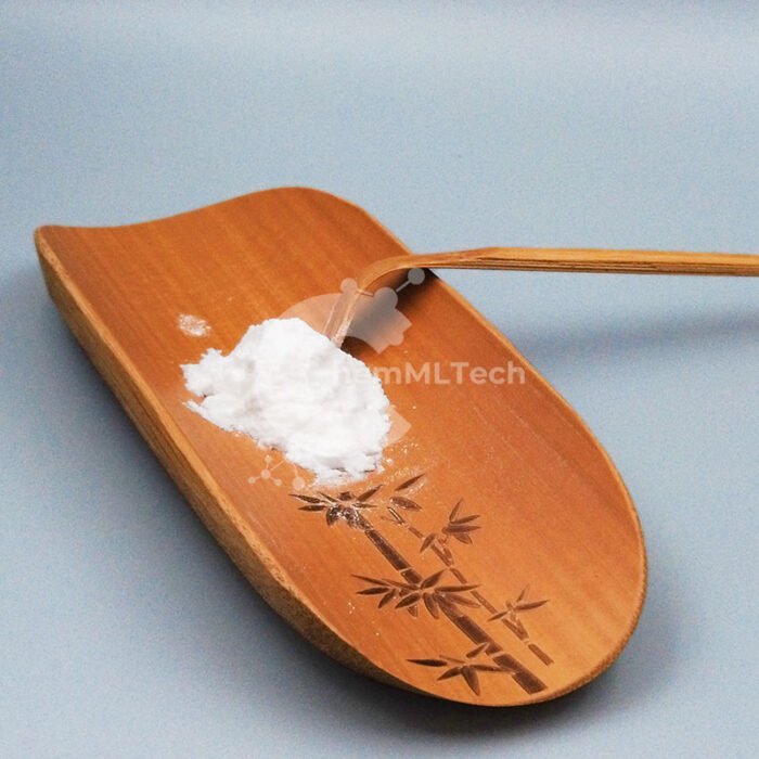 Alpha-Arbutin powder with high purity placed on carved wooden tray, used in whitening skincare and cosmetic formulations