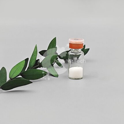 A vial of DSIP Lyophilized Powder (5mg) placed on a bamboo tray with green leaf decoration.