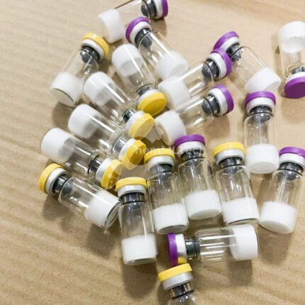 Multiple KPV peptide vials with yellow and purple caps containing white lyophilized powder on kraft paper