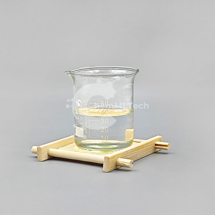 Photo of 1-Methyl-2-pyrrolidone (NMP), a clear liquid displayed in a lab glass beaker, used as an organic solvent.